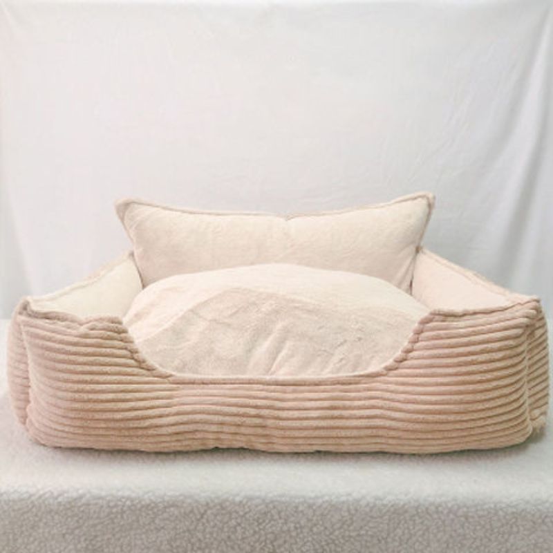 Plush dog bed with washable cover
